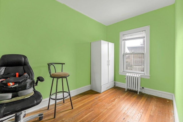 22 King Ave, Yonkers, NY 10704 - office area featuring radiator and light wood-style floors