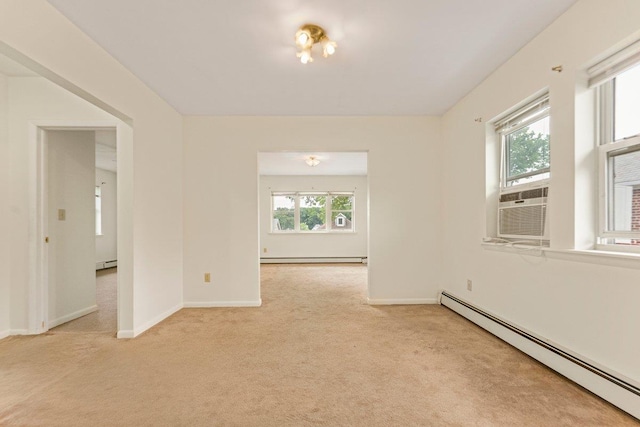 22 King Ave, Yonkers, NY 10704 - empty room with baseboard heating, light colored carpet, a baseboard heating unit, and cooling unit