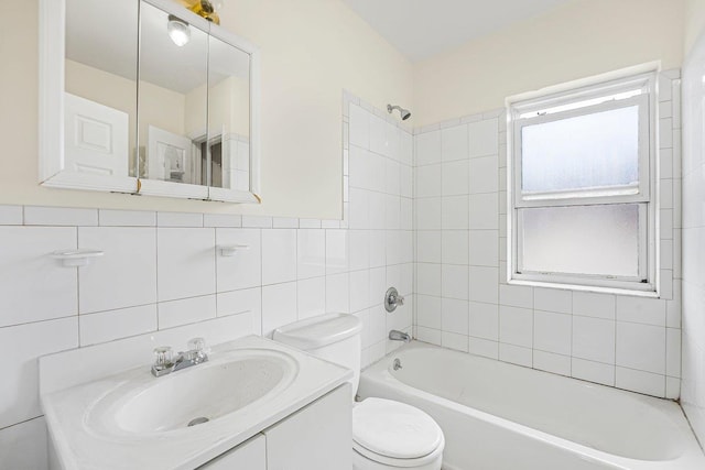 22 King Ave, Yonkers, NY 10704 - bathroom featuring  shower combination, vanity, and tile walls