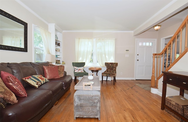 22 Hollywood Ave, Lynbrook, NY 11563 - living room with ornamental molding, hardwood / wood-style floors, and stairs