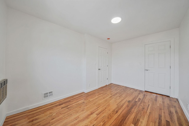 11708A 233rd St, Cambria Heights, NY 11411 - unfurnished bedroom with light wood-type flooring and baseboards