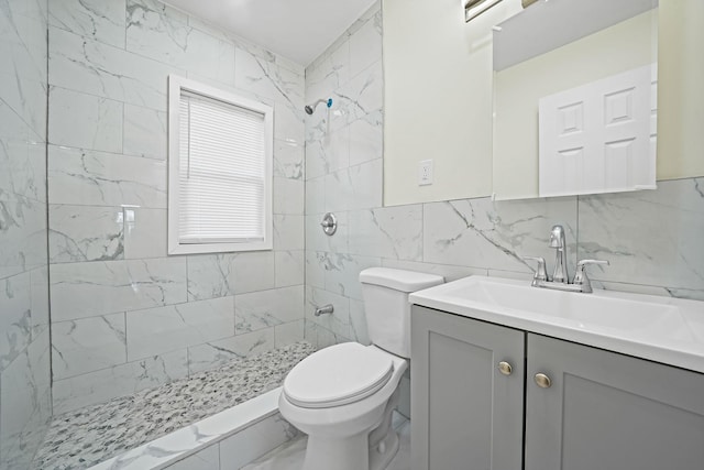 11708A 233rd St, Cambria Heights, NY 11411 - bathroom with tile walls, vanity, and tiled shower
