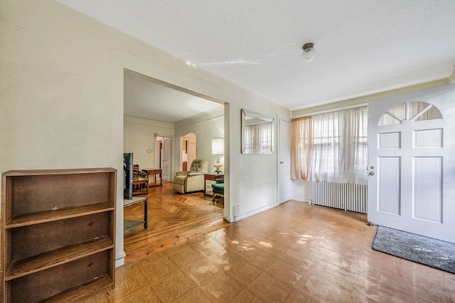 18803 Ilion Ave, Saint Albans, NY 11412 - entrance foyer featuring radiator and arched walkways