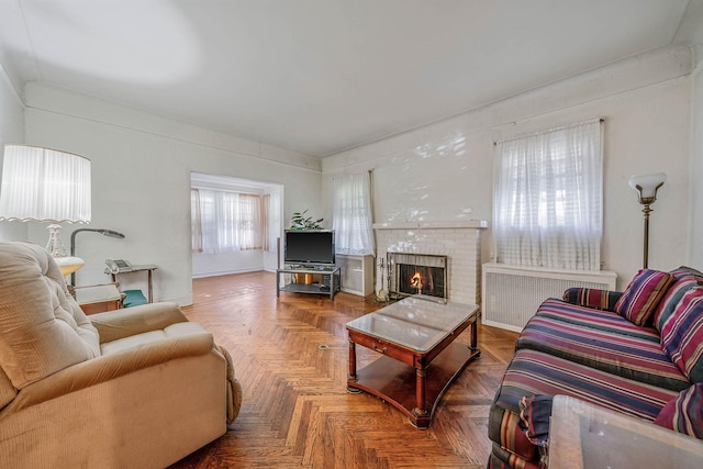 18803 Ilion Ave, Saint Albans, NY 11412 - living room with radiator and a fireplace