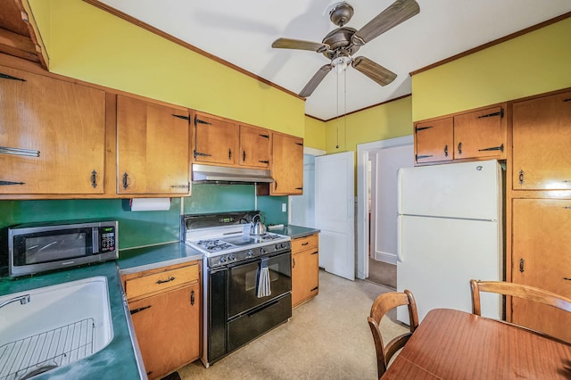 18803 Ilion Ave, Saint Albans, NY 11412 - kitchen featuring freestanding refrigerator, range, stainless steel microwave, under cabinet range hood, and ceiling fan