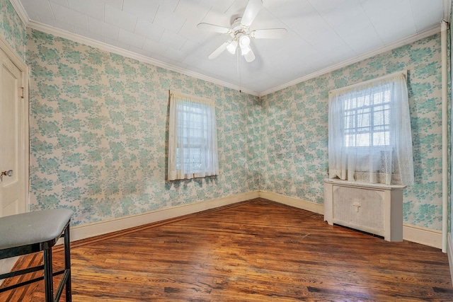 18803 Ilion Ave, Saint Albans, NY 11412 - spare room with wood finished floors, ornamental molding, radiator heating unit, and ceiling fan