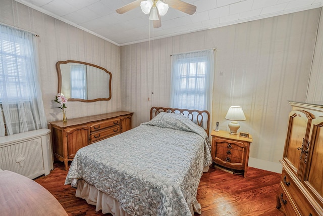 18803 Ilion Ave, Saint Albans, NY 11412 - bedroom featuring wood finished floors, radiator heating unit, ornamental molding, and a ceiling fan