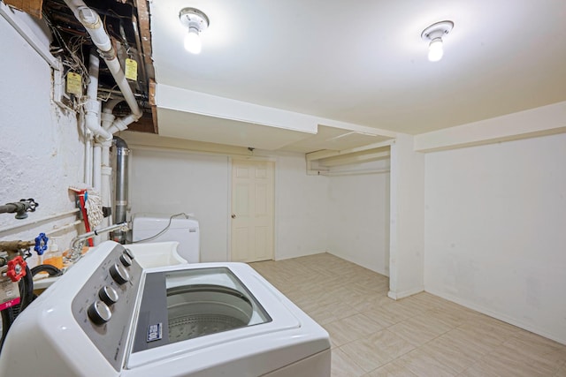 18803 Ilion Ave, Saint Albans, NY 11412 - washroom featuring washer and clothes dryer