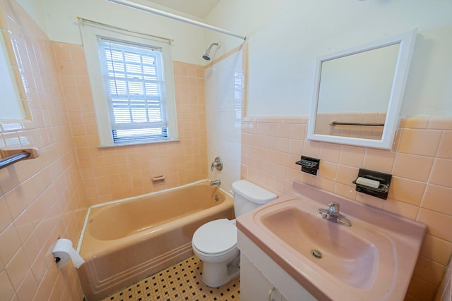 18803 Ilion Ave, Saint Albans, NY 11412 - full bathroom with tile walls,  shower combination, and vanity