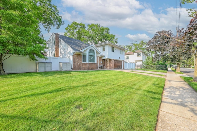 1096 Pearl St, North Woodmere, NY 11581 - view of front of property featuring brick siding, a garage, and driveway