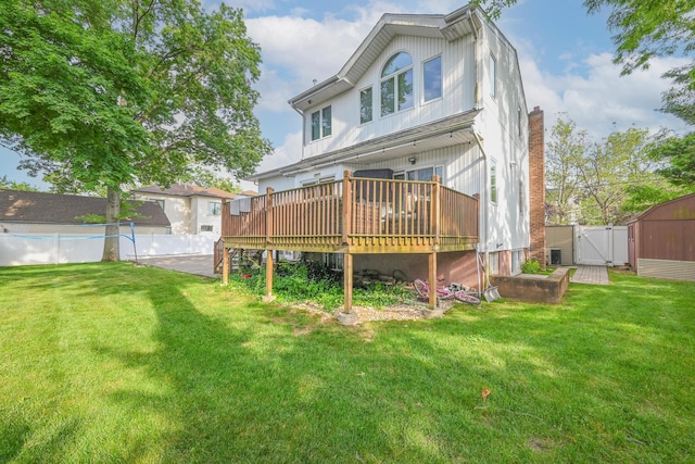 1096 Pearl St, North Woodmere, NY 11581 - rear view of property featuring a gate, a wooden deck, and a fenced backyard