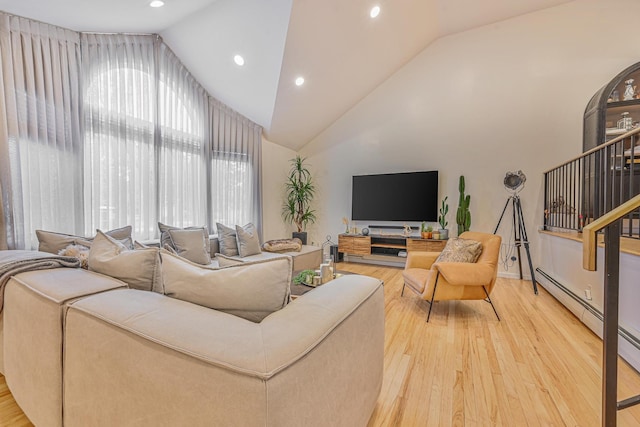 1096 Pearl St, North Woodmere, NY 11581 - living room featuring light wood-type flooring, high vaulted ceiling, recessed lighting, and a baseboard radiator