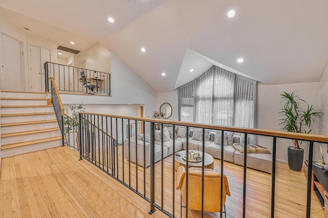 1096 Pearl St, North Woodmere, NY 11581 - corridor with wood finished floors, vaulted ceiling, and recessed lighting