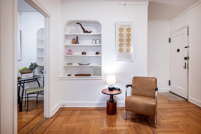 601 Pelham Pkwy N Unit 516, Bronx, NY 10467 - sitting room with built in shelves and crown molding