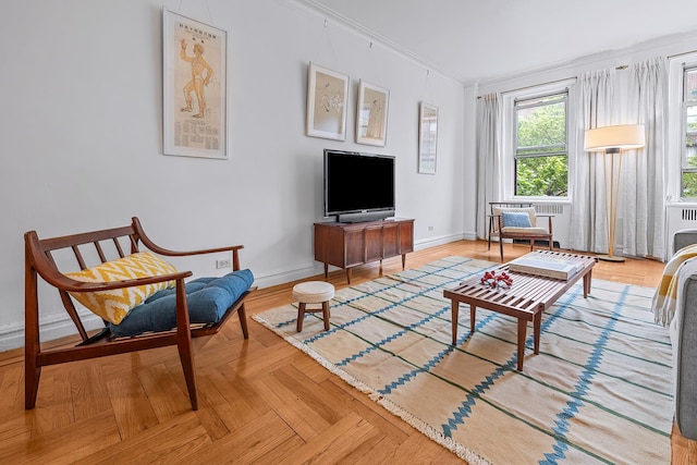 601 Pelham Pkwy N Unit 516, Bronx, NY 10467 - living room featuring crown molding and baseboards
