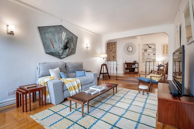 601 Pelham Pkwy N Unit 516, Bronx, NY 10467 - living area featuring arched walkways, ornamental molding, and wood finished floors
