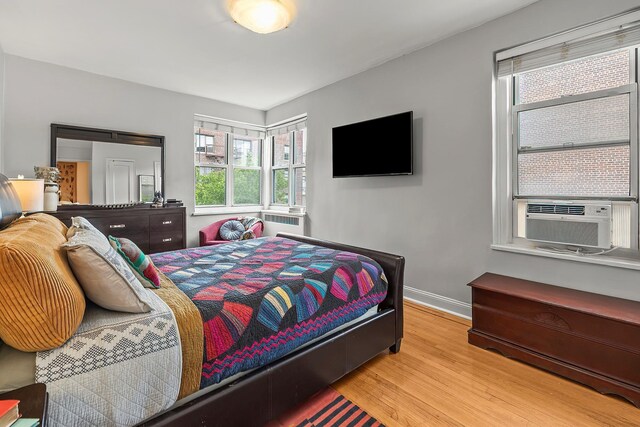 601 Pelham Pkwy N Unit 516, Bronx, NY 10467 - bedroom with wood finished floors and cooling unit