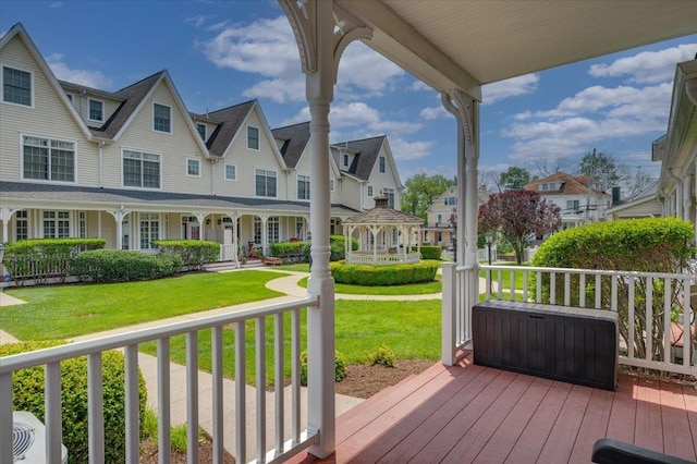 19 Olivia St Unit 5, Port Chester, NY 10573 - wooden porch with a residential view, a lawn, and a gazebo