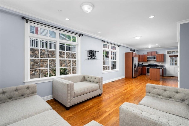 19 Olivia St Unit 5, Port Chester, NY 10573 - living area featuring crown molding, light wood finished floors, and recessed lighting