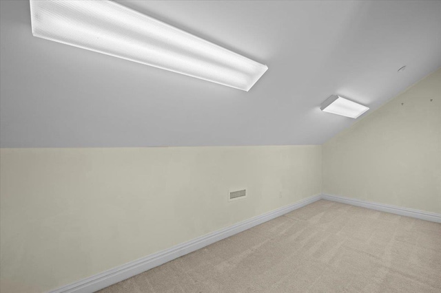 19 Olivia St Unit 5, Port Chester, NY 10573 - bonus room with vaulted ceiling and light colored carpet