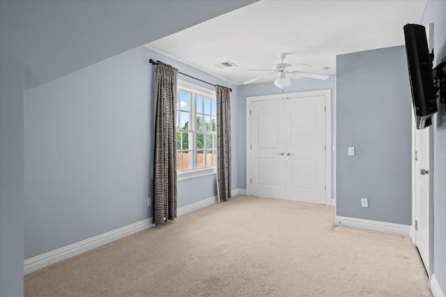 19 Olivia St Unit 5, Port Chester, NY 10573 - unfurnished bedroom featuring carpet flooring, a closet, and ceiling fan