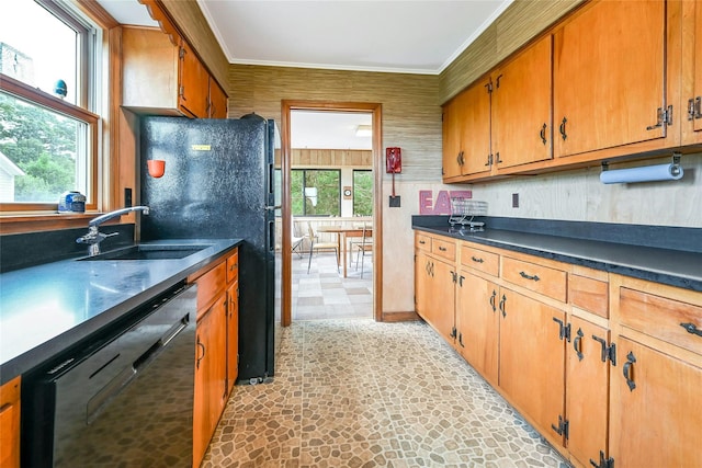 103 Harbor Beach Rd, Miller Place, NY 11764 - kitchen with black appliances, dark countertops, plenty of natural light, ornamental molding, and brown cabinets