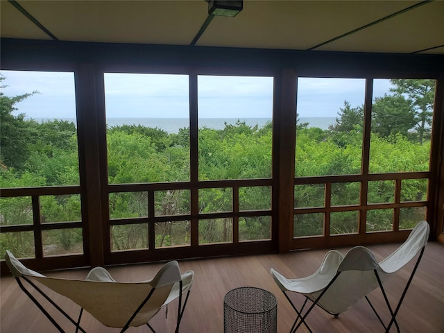 103 Harbor Beach Rd, Miller Place, NY 11764 - sunroom / solarium featuring a water view and wood finished floors
