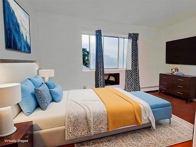 1811 123rd St Unit 4F, College Point, NY 11356 - bedroom featuring baseboard heating and wood finished floors