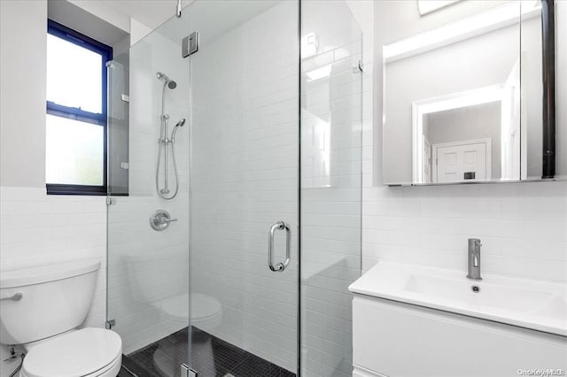 160-15 Powells Cove Blvd Unit B103, Beechhurst, NY 11357 - bathroom featuring tile walls, a stall shower, and vanity