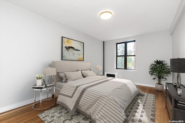 160-15 Powells Cove Blvd Unit B103, Beechhurst, NY 11357 - bedroom featuring wood finished floors and radiator