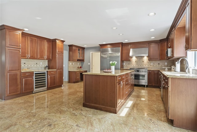 94 Hirst Rd, Briarcliff Manor, NY 10510 - kitchen with appliances with stainless steel finishes, wine cooler, extractor fan, decorative backsplash, and recessed lighting