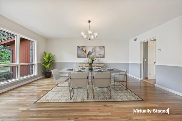 94 Hirst Rd, Briarcliff Manor, NY 10510 - dining space featuring a chandelier and wood finished floors