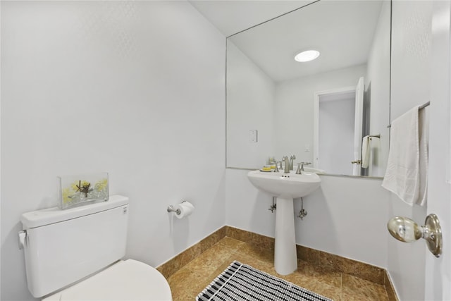 94 Hirst Rd, Briarcliff Manor, NY 10510 - bathroom with toilet and tile patterned floors