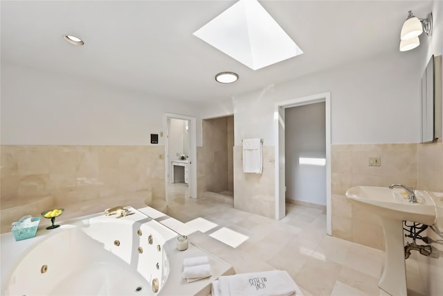 94 Hirst Rd, Briarcliff Manor, NY 10510 - bathroom with a skylight, a tub with jets, tile walls, and tile patterned floors