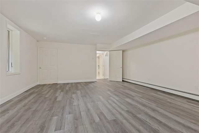 94 Hirst Rd, Briarcliff Manor, NY 10510 - spare room with wood finished floors and baseboard heating