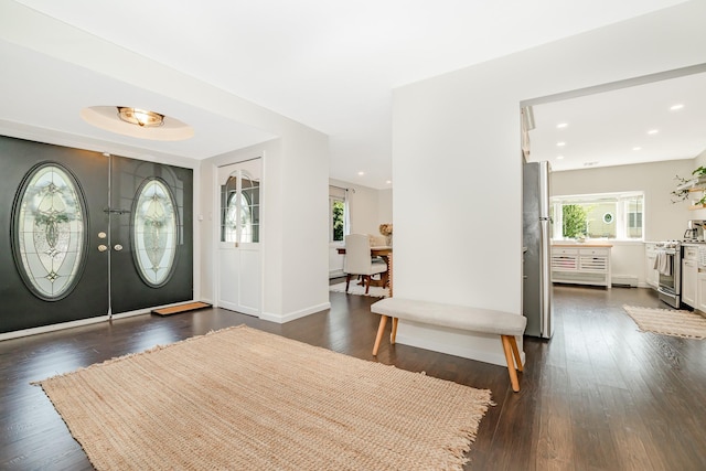 27 Dorchester Rd, Smithtown, NY 11787 - entrance foyer with dark wood-style flooring, recessed lighting, and french doors