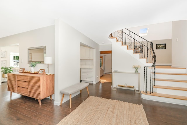 27 Dorchester Rd, Smithtown, NY 11787 - entryway with stairs and dark wood-style flooring