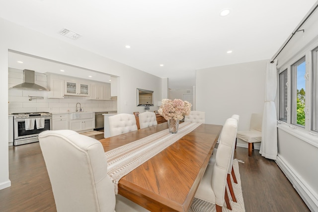 27 Dorchester Rd, Smithtown, NY 11787 - dining room featuring dark wood-type flooring, a baseboard radiator, and recessed lighting