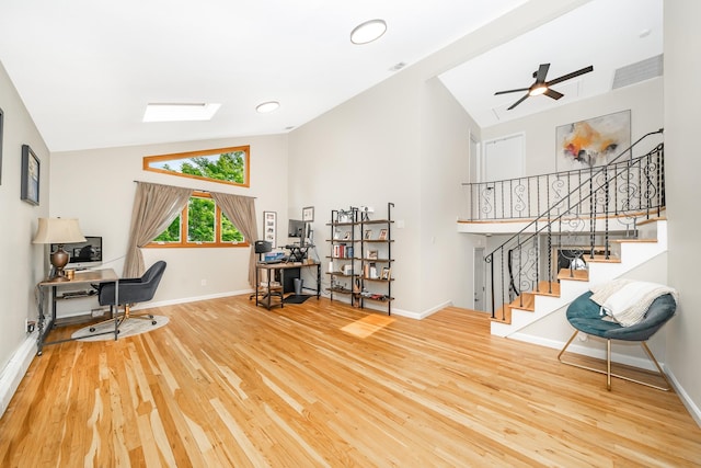 27 Dorchester Rd, Smithtown, NY 11787 - office space featuring vaulted ceiling, wood finished floors, and a skylight