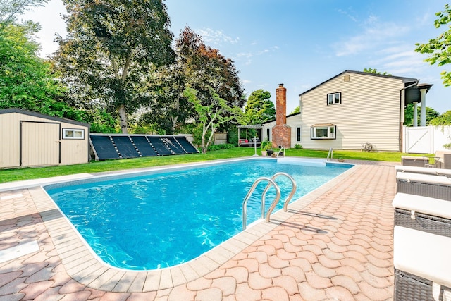 27 Dorchester Rd, Smithtown, NY 11787 - view of pool featuring a storage shed and a patio area