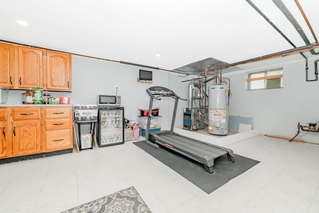 27 Dorchester Rd, Smithtown, NY 11787 - exercise room featuring water heater, light floors, and recessed lighting