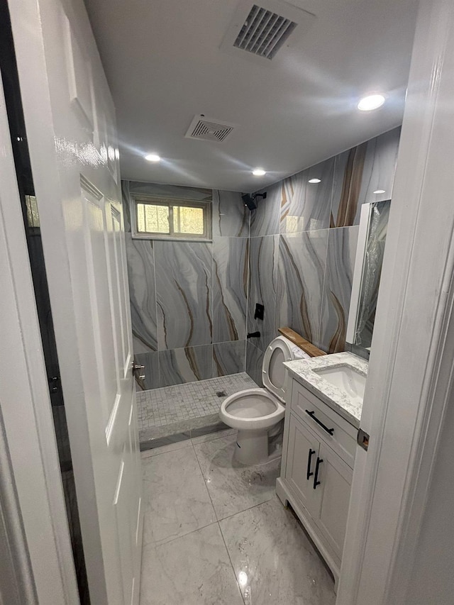 167-12 110th Ave, Jamaica, NY 11433 - full bathroom featuring a stall shower, marble finish flooring, vanity, and recessed lighting