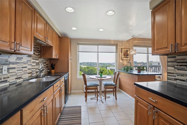 300 High Point Dr Unit 711, Hartsdale, NY 10530 - kitchen with brown cabinetry, light tile patterned floors, backsplash, and recessed lighting