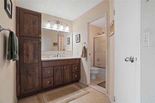 300 High Point Dr Unit 711, Hartsdale, NY 10530 - full bathroom featuring tile patterned floors, vanity, and enclosed tub / shower combo