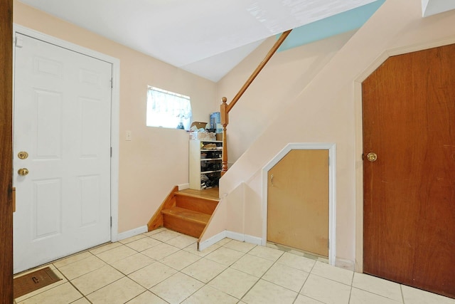 49 Nanny Hagen Rd, Thornwood, NY 10594 - entryway with stairway and light tile patterned flooring