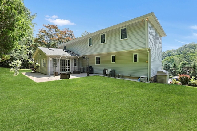 49 Nanny Hagen Rd, Thornwood, NY 10594 - rear view of house with a patio, a yard, and a gazebo