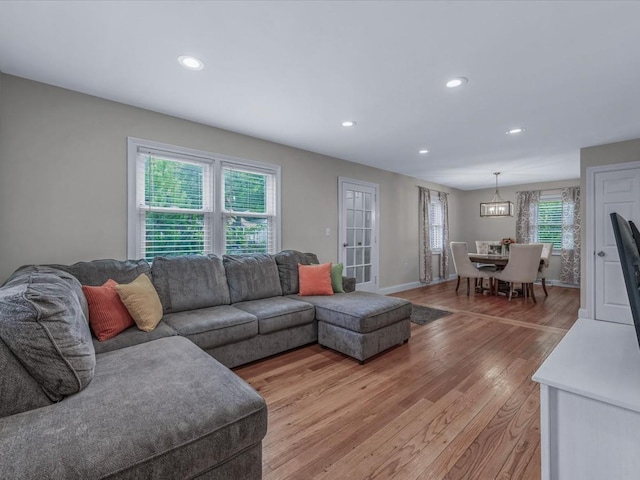 71 Van Nostrand Ave, North Merrick, NY 11566 - living room with light wood-type flooring and recessed lighting