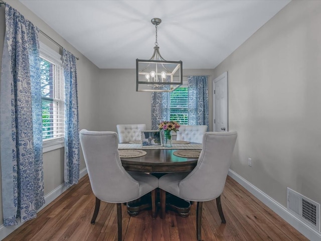 71 Van Nostrand Ave, North Merrick, NY 11566 - dining space with a chandelier and wood finished floors