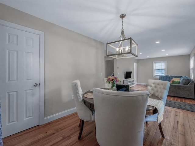 71 Van Nostrand Ave, North Merrick, NY 11566 - dining area featuring a chandelier, wood finished floors, and recessed lighting
