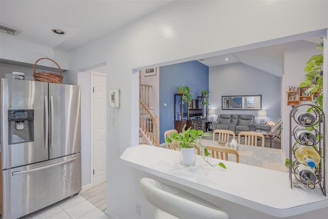 2953 Bluepoint Ct, Wantagh, NY 11793 - kitchen with stainless steel fridge, light tile patterned floors, light countertops, and recessed lighting